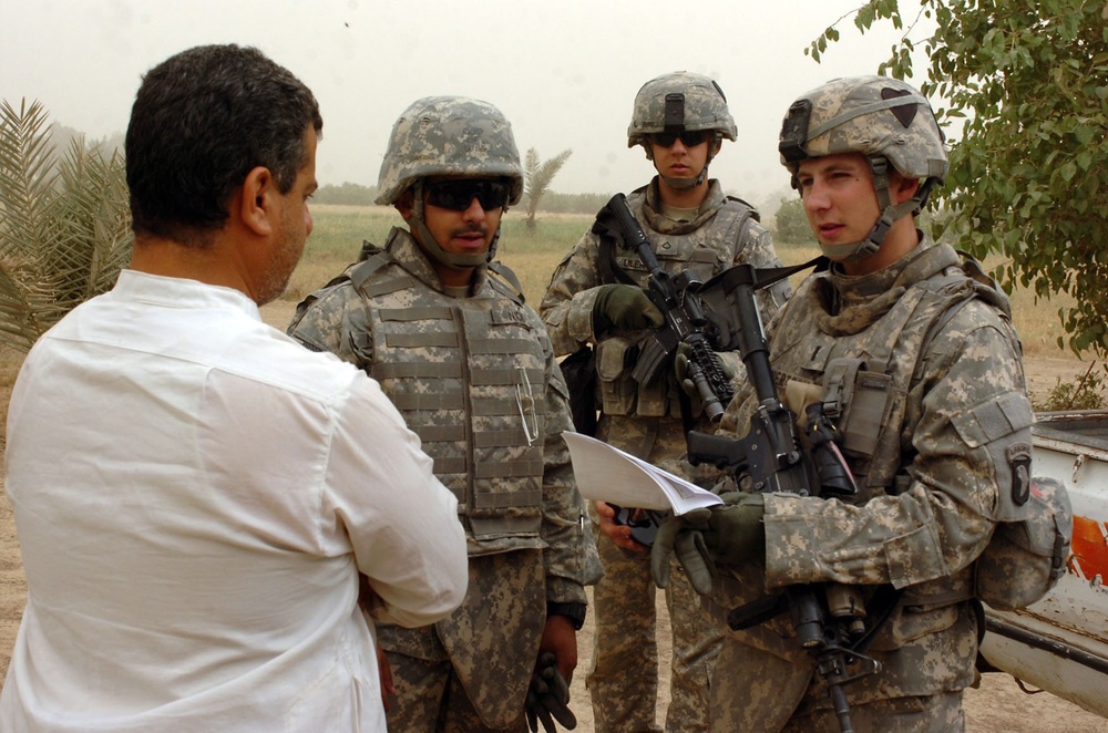 Soldiers consult sheiks