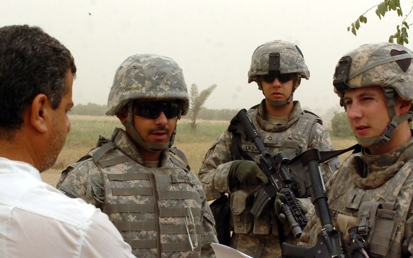 Soldiers consult sheiks