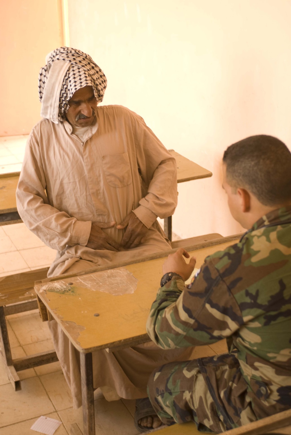 Coalition forces bring aid to village