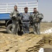 Joint U.S. Army, Iraqi national police forces unearth weapons cache in Abu Thayla