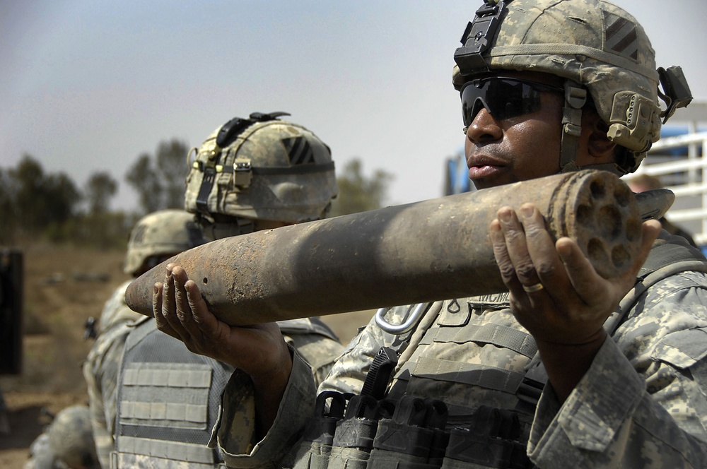 Joint U.S. Army, Iraqi National Police Forces Unearth Weapons Cache in Abu Thayla