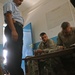 Iraqi police train with Marines, get paid