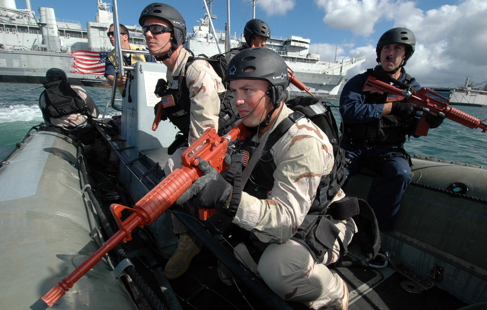 USS Chung-Hoon Sailors practice search and seizure techniques