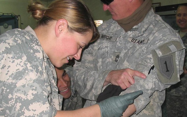 Strike Soldiers provide medical care to wounded, sick patients