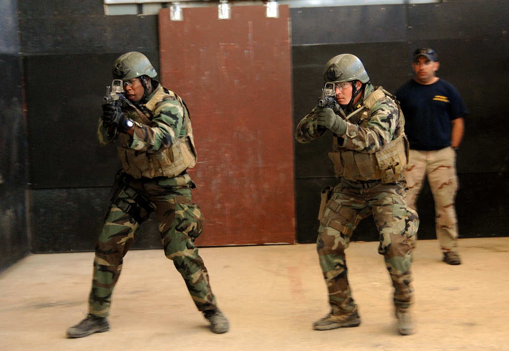 Navy SEAL's conduct close quarters combat training