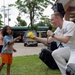USS Blue Ridge Sailors visit with Thai children
