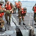 Naval supply ships drop off gear for exercise Cobra Gold