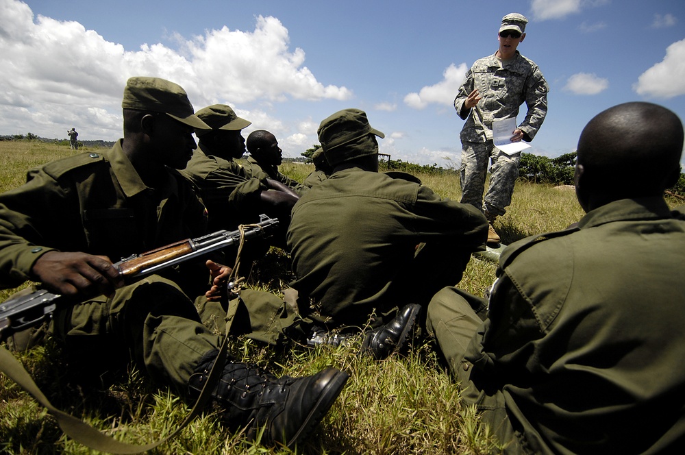 The Old Guard Soldiers train members of the Uganda People's Defence Force