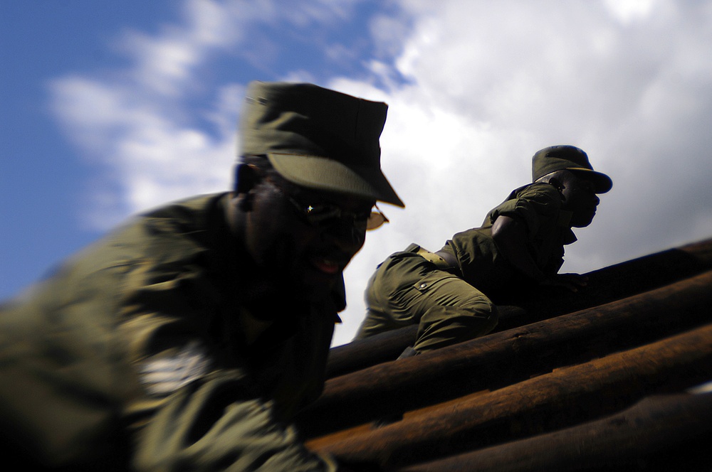 The Old Guard Soldiers train members of the Uganda People's Defence Force