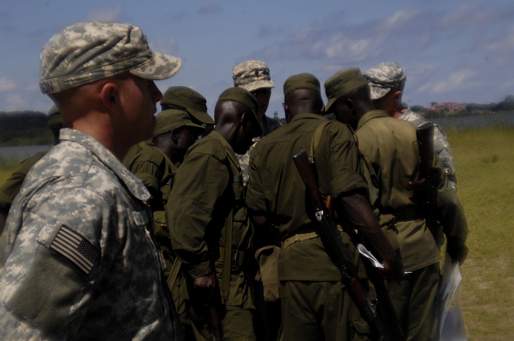 The Old Guard Soldiers train members of the Uganda People's Defence Force