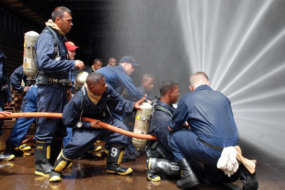 U.S. and Malagasy Navy sailors practice damage control and firefighting techniques U.S. and Malagasy Navy sailors practice damage control and firefighting techniques