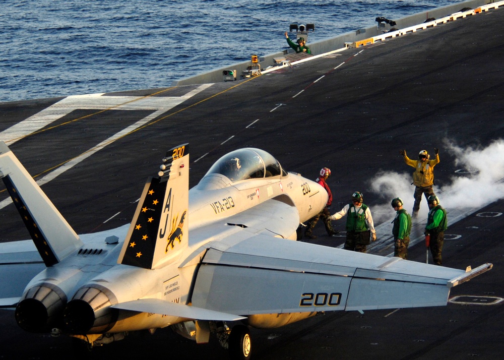 Tomcatters and Blacklions conduct flight operation aboard USS Theodore Roosevelt