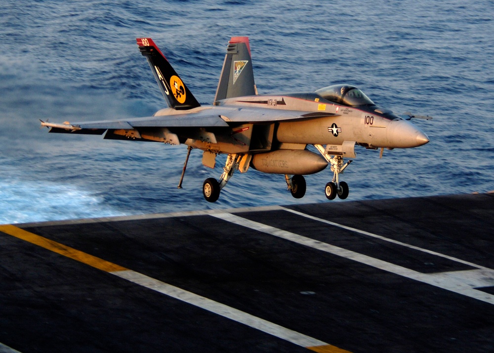 Tomcatters and Blacklions conduct flight operation aboard USS Theodore Roosevelt