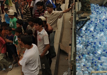 Iraqi Army hands out water, food to Sadr City residents