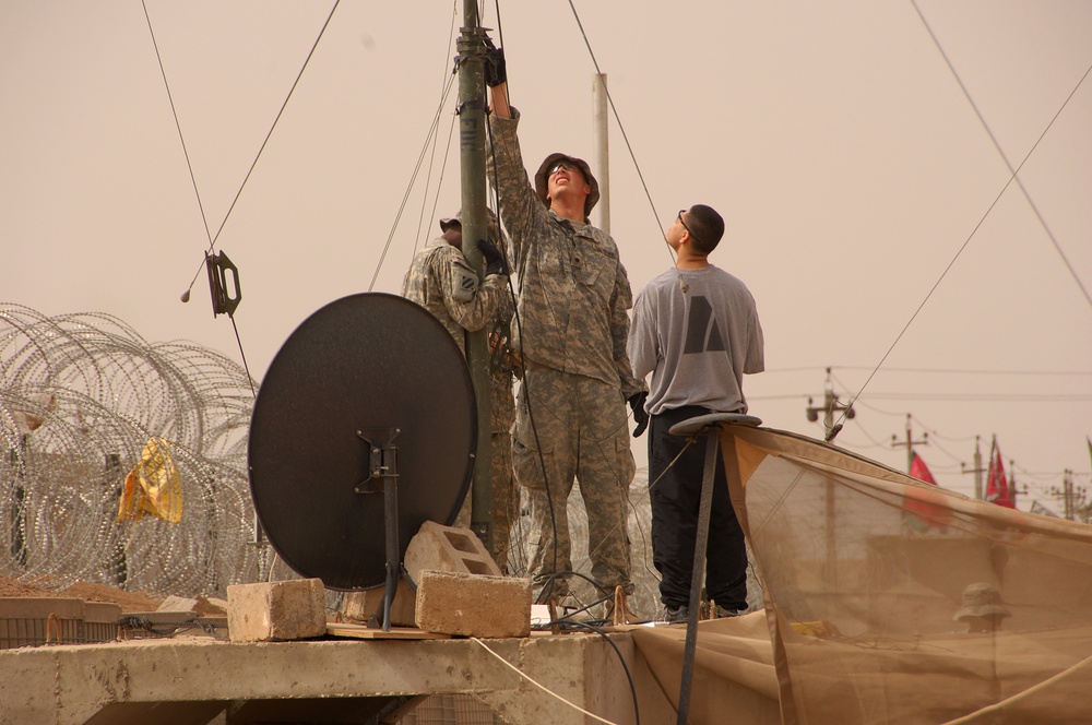 Communications work at Combat Outpost Salle