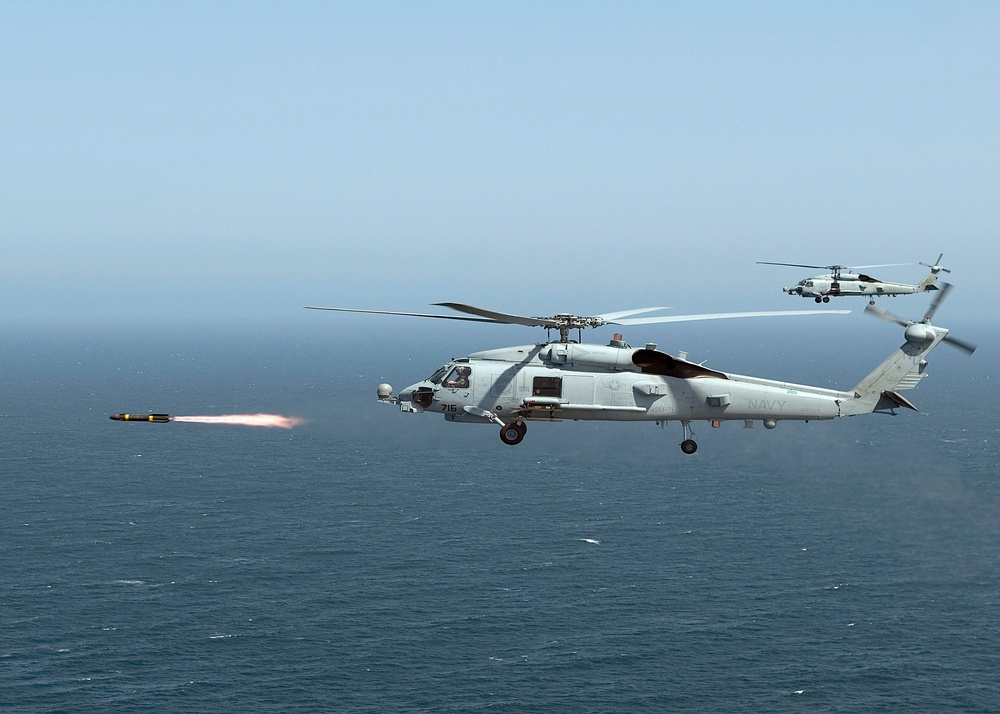 Navy Seahawk fires Hellfire missile