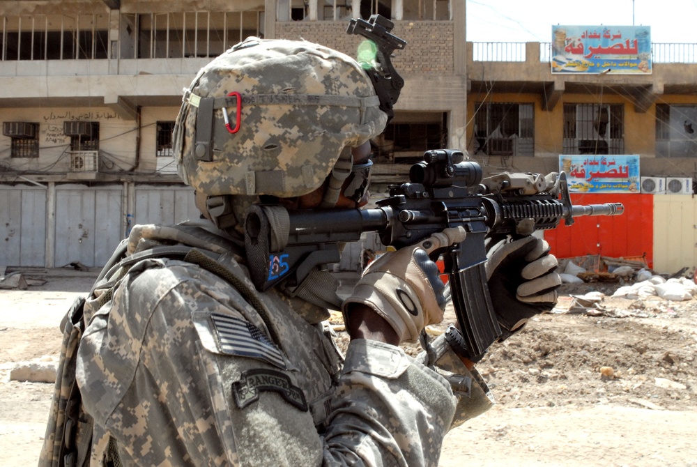 Multi-National Division - Baghdad Soldiers Provide Security During Mission in Sadr City