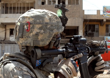 Multi-National Division - Baghdad Soldiers Provide Security During Mission in Sadr City