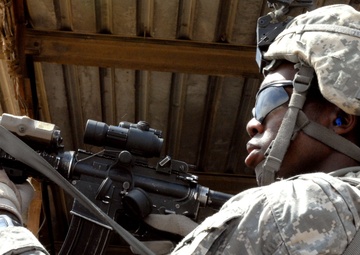 Multi-National Division - Baghdad Soldiers provide security during mission in Sadr City