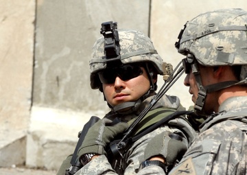 Multi-National Division - Baghdad Soldiers provide security during mission in Sadr City