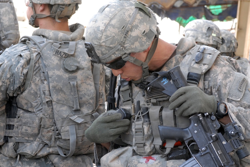 Multi-National Division - Baghdad Soldiers Provide Security During Mission in Sadr City