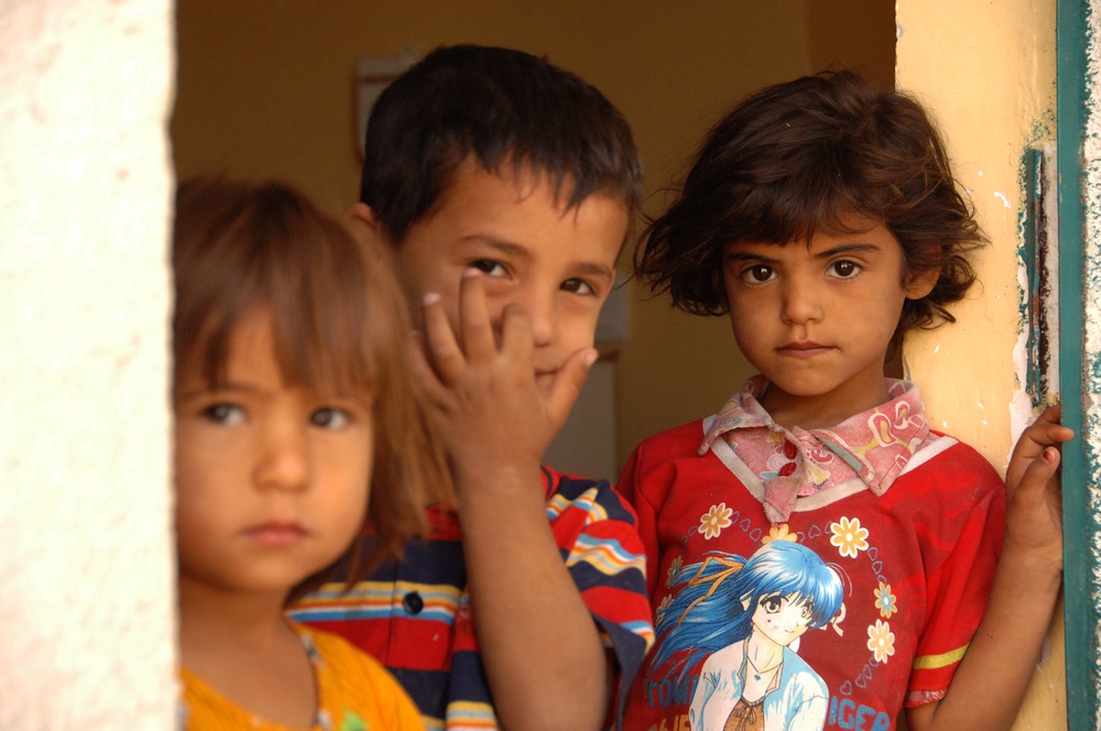 Iraqi Children Watch a Patrol