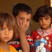 Iraqi Children Watch a Patrol