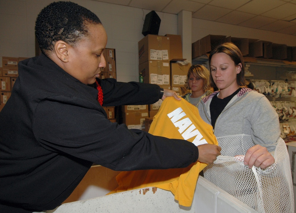 Navy recruit receives new physical training uniforms