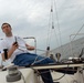 Sailors race sailboats off Norfolk