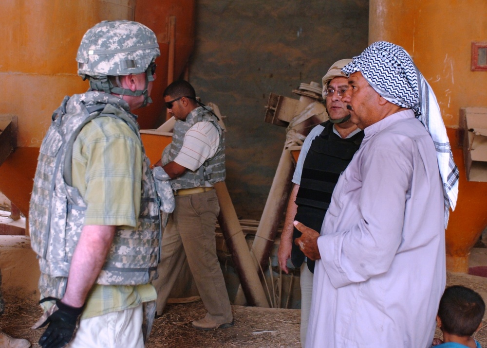 State Department, Coalition Troops Help Owner of Iraqi Feed Mill