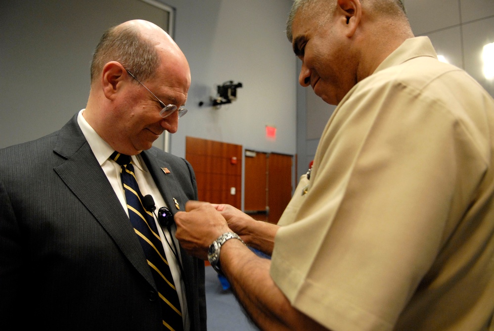 Top Navy enlisted makes Secretary of the Navy a master chief, tries new physical training gear