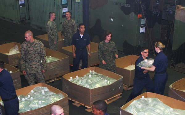 Sailors and Marines prepare for possible humanitarian assistance