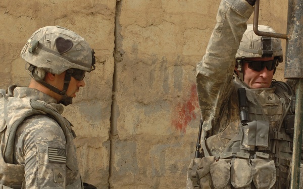 Troops set up obstacles to help halt enemy movements in, out of Shulla