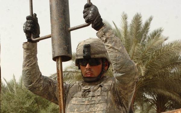 Troops set up obstacles to help halt enemy movements in, out of Shulla