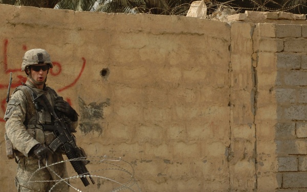 Troops set up obstacles to help halt enemy movements in, out of Shulla