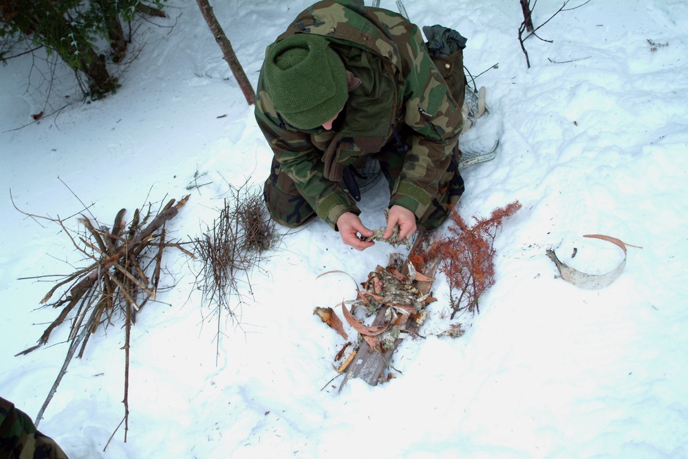 Sailors learn evasion and survival skills in Maine