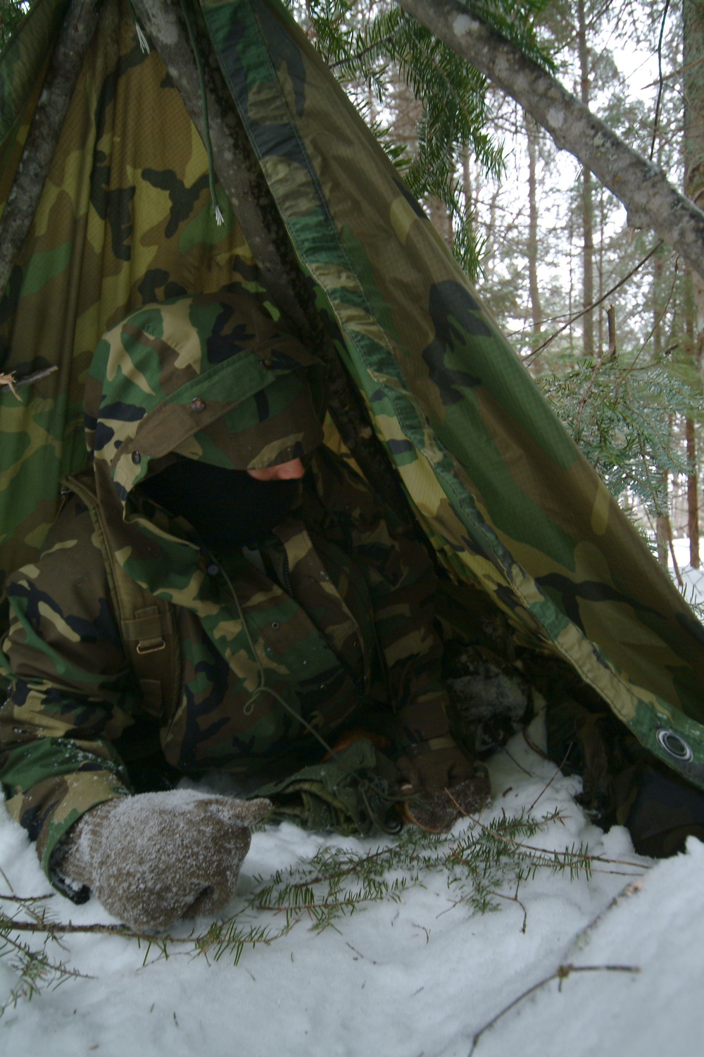 Sailors learn evasion and survival skills in Maine