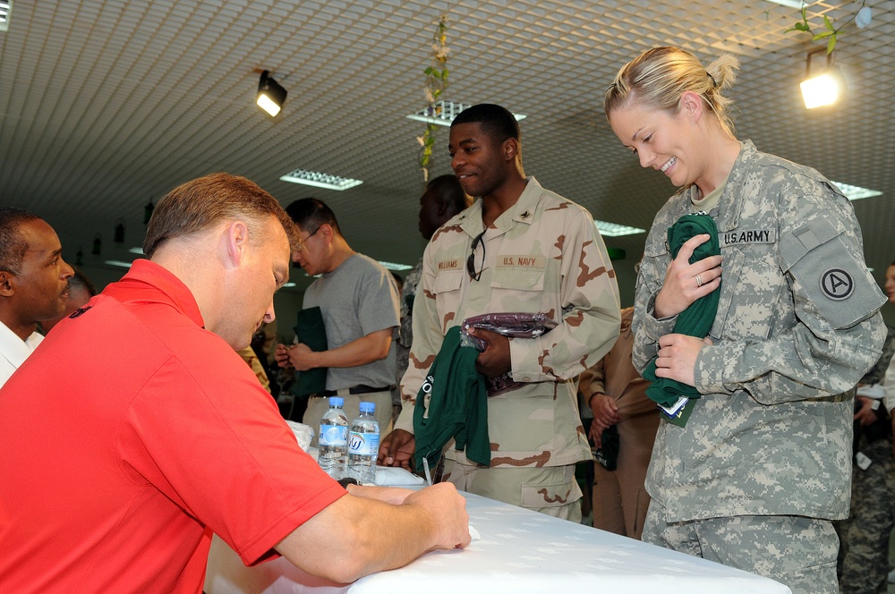 College Football Coaches Visit Fans in Qatar