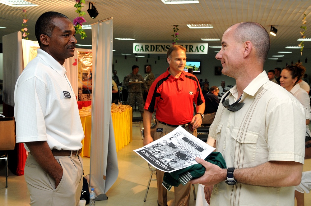 College Football Coaches Visit Fans in Qatar