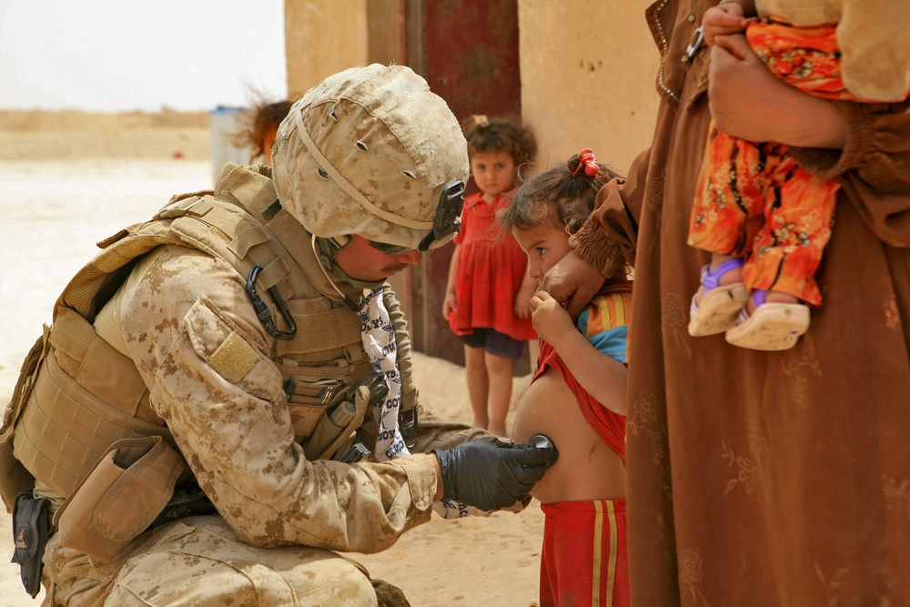 Navy Corpsman Provides Aide