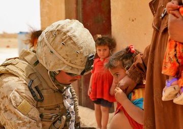 Navy Corpsman Provides Aide