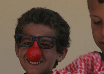 Marines and Navy Corpsmen Pass Out Toys