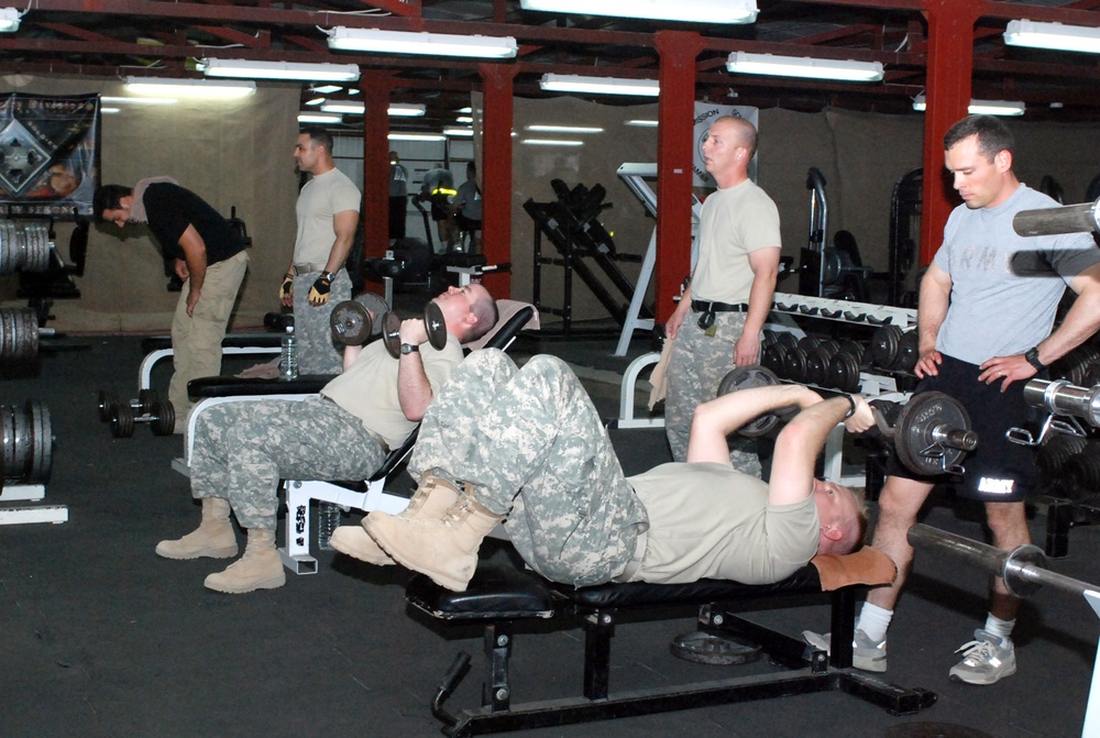 4th Infantry Division band member keeps division gym in tune