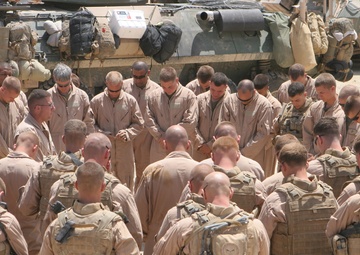 Marines Pray Prior to Mission