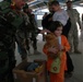 Iraqi army soldiers share tender moment with children in Jamilla