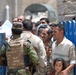 Iraqi soldiers provide food, medical aid to local residents