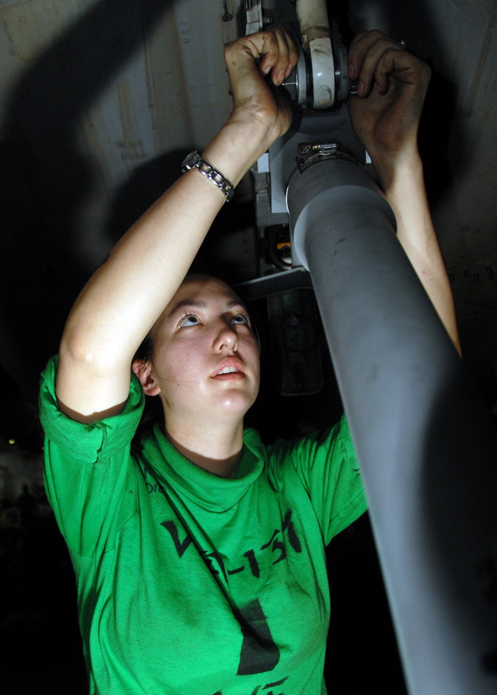 Super Hornet adjusted on USS Abraham Lincoln