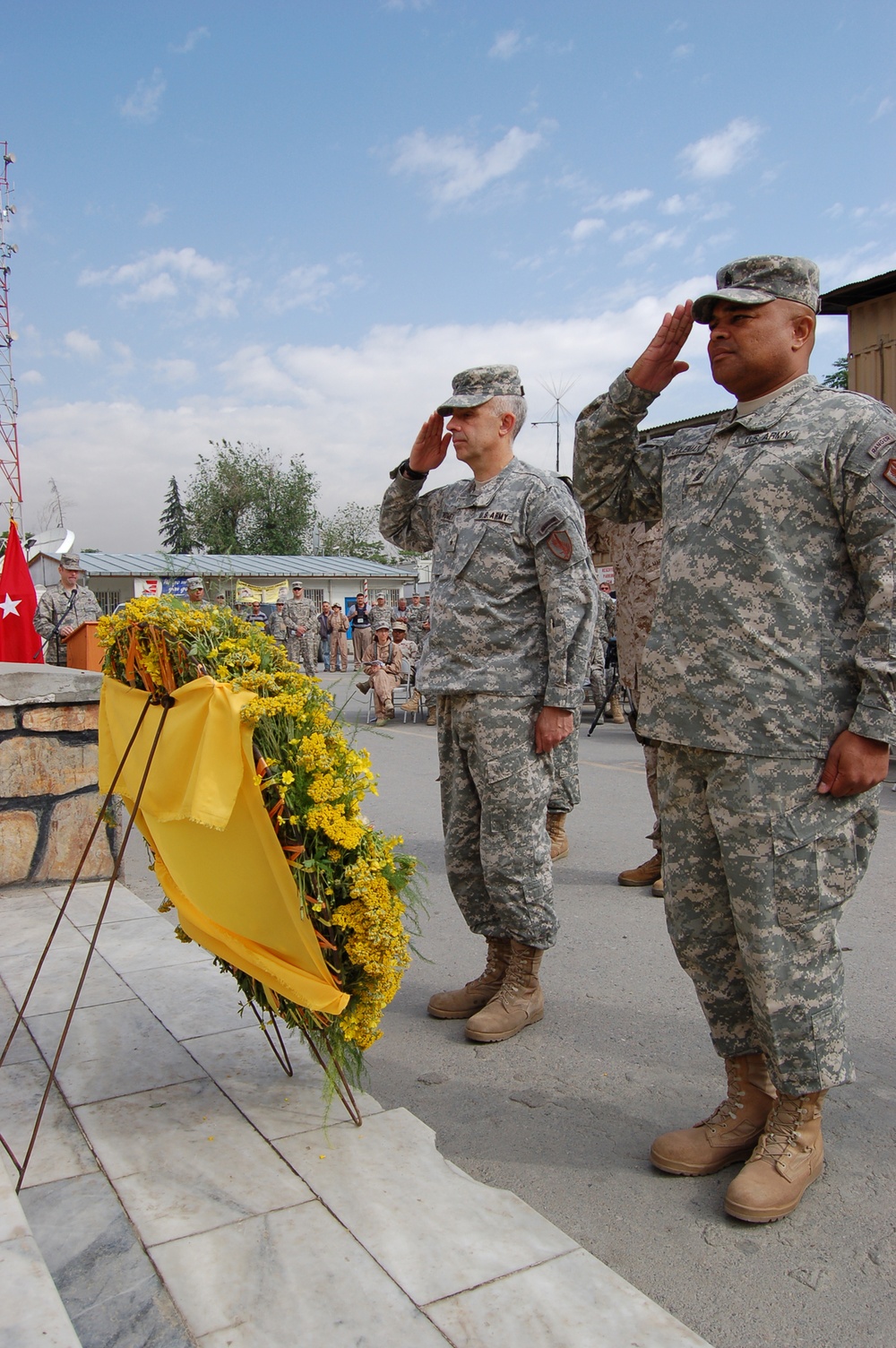 Deployed service members honor fallen heroes