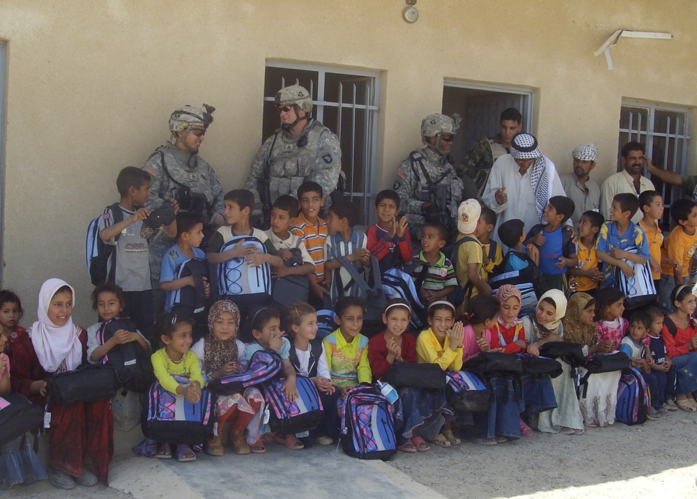 2-320th FAR &amp;amp; ISF give to Iraqi school children