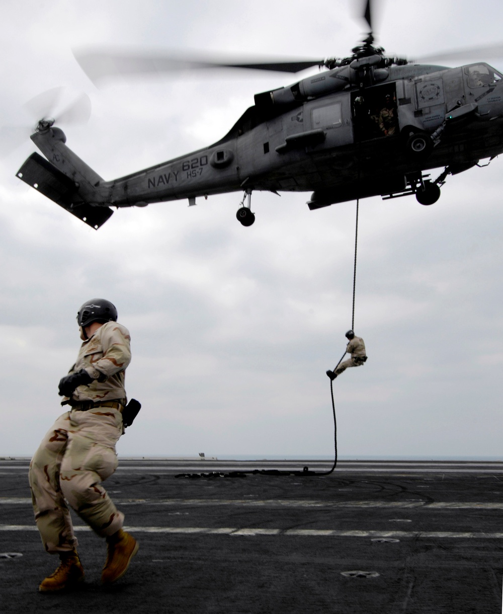 Sailors practice fast rope techniques abord USS Harry S. Truman